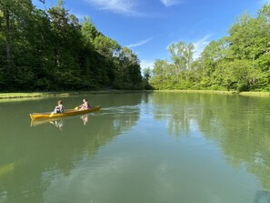 Lake on front of property to fish, canoe, paddle board, & swim!