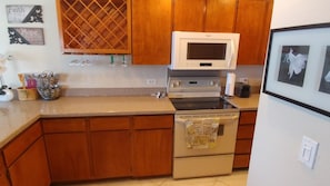 Large kitchen with granite counter tops