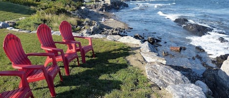 Taken from the point which faces east. There is a small rocky beach to the left.