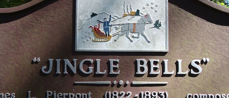 The sign in Troup Square commemorating the writing of "Jingle Bells" in 1857.