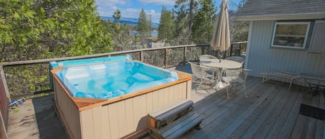 Stargaze from the spa or dine on the deck. Guests LOVE soaking under the stars!