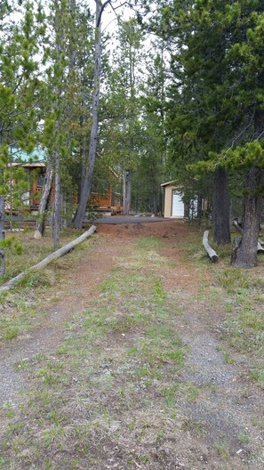 2nd driveway enter from main road, share with neighbor.