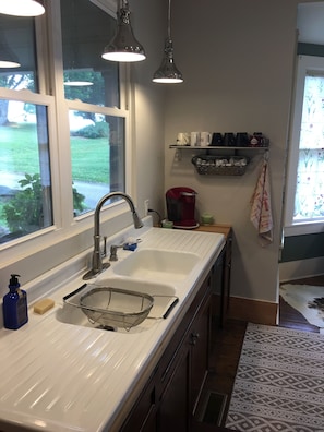 1950's farmhouse style sink with plenty of room for family meal preparation