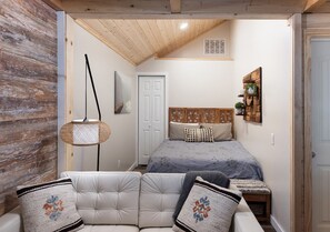 Open concept living space with newly remodeled sleeping space