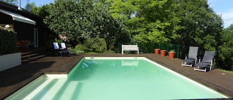 Relax in and around the private lagoon pool