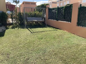 garden swing at top of garden