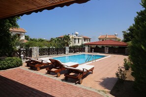 Pool from BBQ area, Garage beyond pool