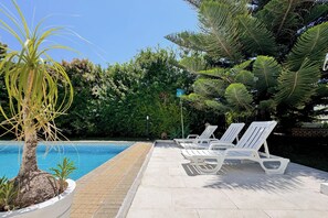 Lounging shares for sunbathing or relaxing in the shade of our huge pine tree 