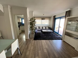 Large patio doors leading onto the terrace