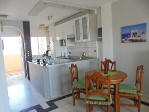 Entrance door and kitchen