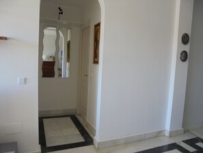 Hall to bedroom and bathroom