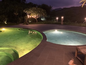 Our beautiful pool, all lit up at night. 