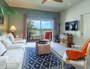 Spacious Living Room with Disney's Animal Kingdom Theme overlooking the lake 