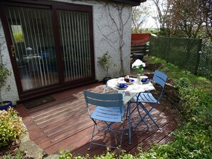 Private patio garden looking towards apartment.