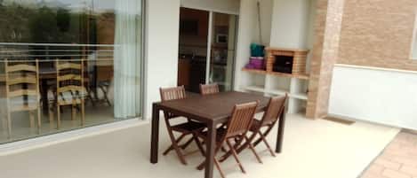 Spacious terrace with private built in BBQ and large dining area