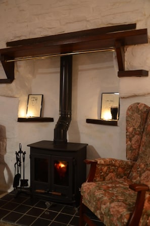 Cosy up by the stove in the evening.