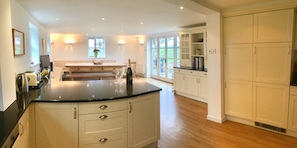 Massive kitchen with dining area