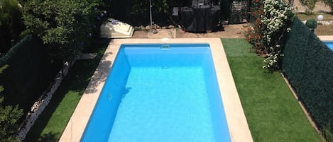 Private Swimming pool. Lake in the background