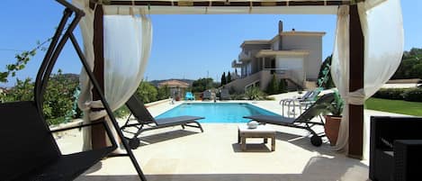 View of the swimming pool and the Villa