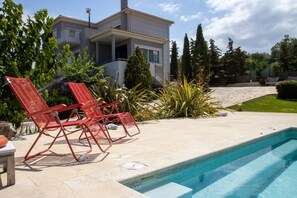 Sun lounge chairs by the pool