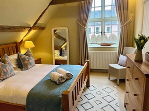 Double bedroom 1 with King size bed and en-suite shower room. 