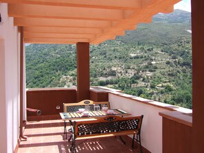 Corner of the large terrace with wraparound stunning mountain and lake views 