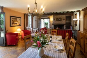 Dining area - locally made solid oak furniture & seating for 10