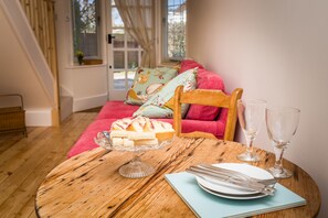 The annexe is open, light and bright with windows at the front and back