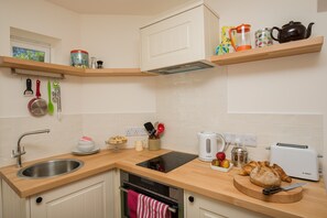 The kitchenette is carefully appointed for your ease and convenience