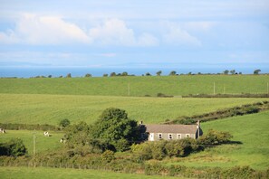 Set in rolling countryside, that's the sea just behind the hill