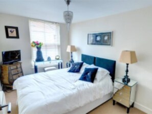 Bedroom 1 with two single beds or made into a double as pictured
