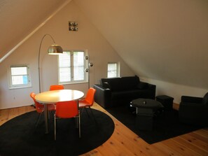 The living room, the sofa can be turned into a guest bed 