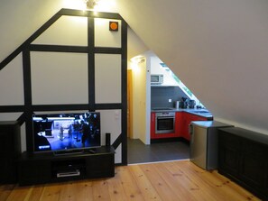View from the living room into the open kitchen