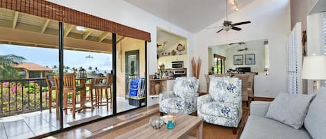 Living Room Looking into Dining Room and Kitchen.  Awesome ocean view from Lanai