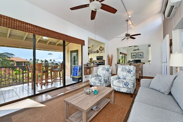 Living Room Looking into Dining Room and Kitchen.  Awesome ocean view from Lanai