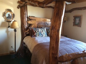 Custom log bed and super comfortable queen mattress