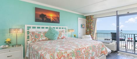 Comfy king bed overlooking the ocean