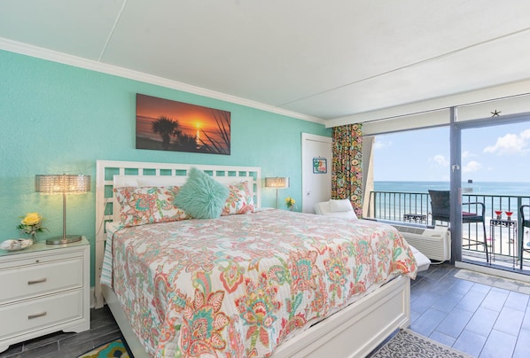 Comfy king bed overlooking the ocean