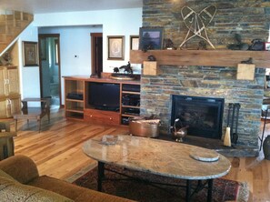 one of two seating areas.  This one has a custom rock fireplace.