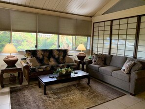 Living room with futon and queen sofa couch