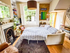 Sofa bed can be set up in living room to create a 3rd bedroom