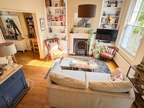 Bright living room that could also be 3rd bedroom