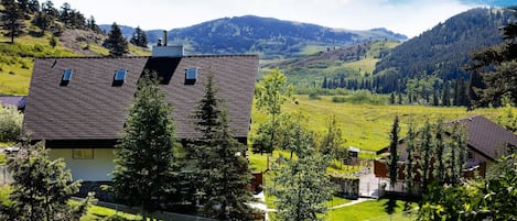 The guesthouse on the right.