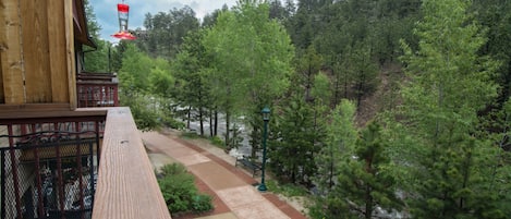 Deck overlooking the Riverwalk. There are not many rentals right on the river.