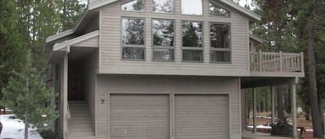 7 Playoff Lane, with double garage, an upper deck and lower patio