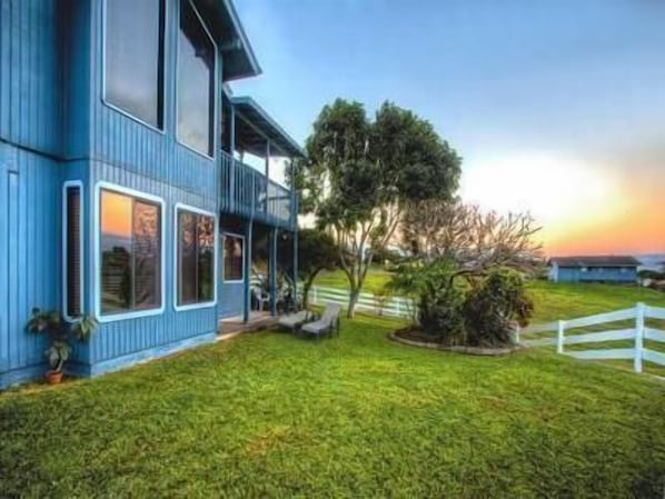 Back yard view w/ Lots of Lushes Green Grass to enjoy the breath taking views.