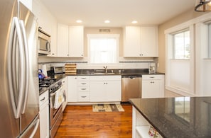 You'll be able to prepare great meals in this fully equipped kitchen.
