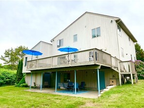 Back Yard showing Large Deck, Lower Patio with Light's, 2 Umbrella's on Deck  