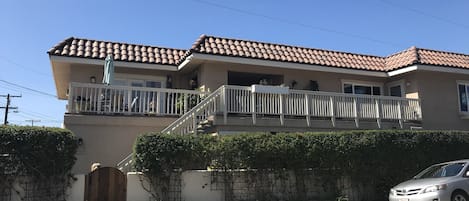 Outside, this house is upstairs