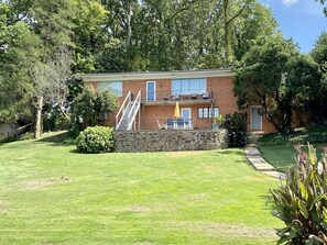 The lake side of the home.